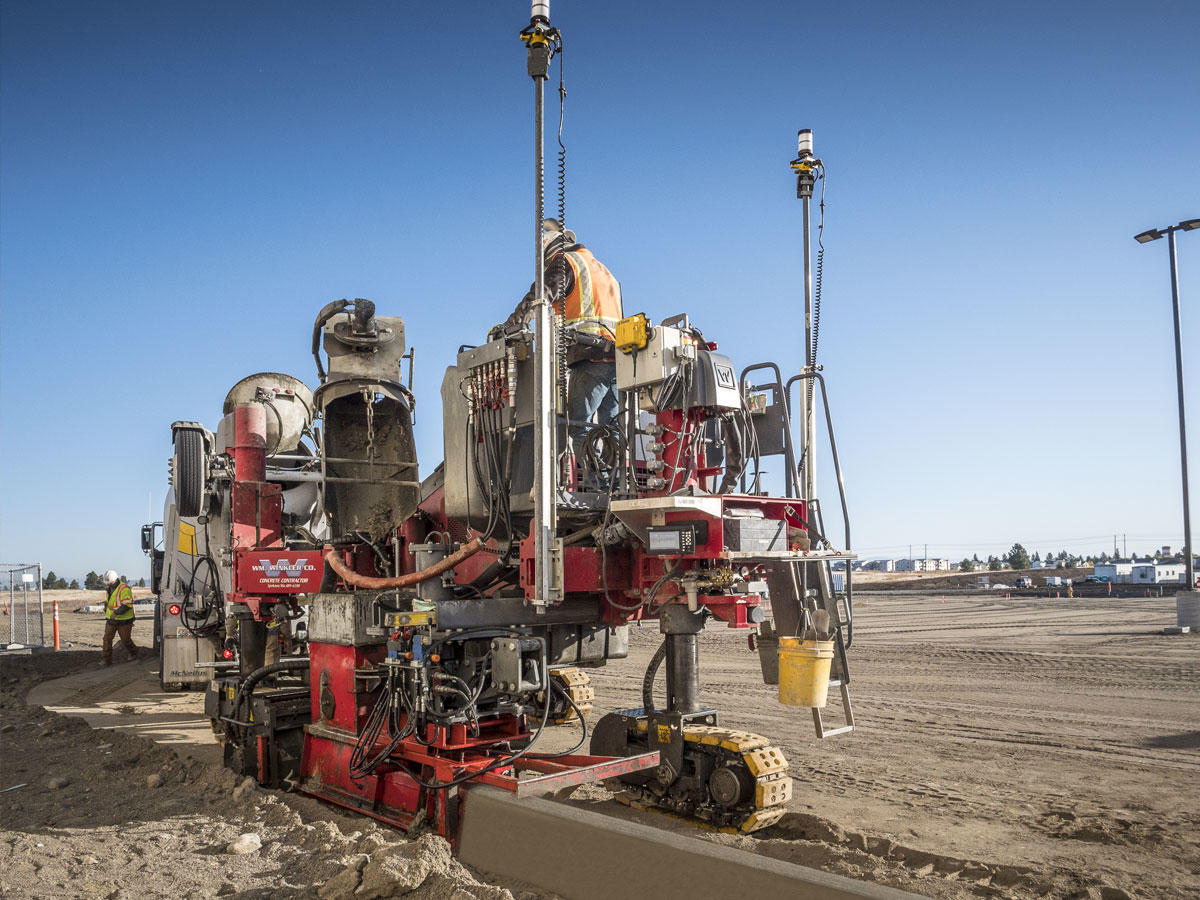 Curb and gutter concreete paving with paving control